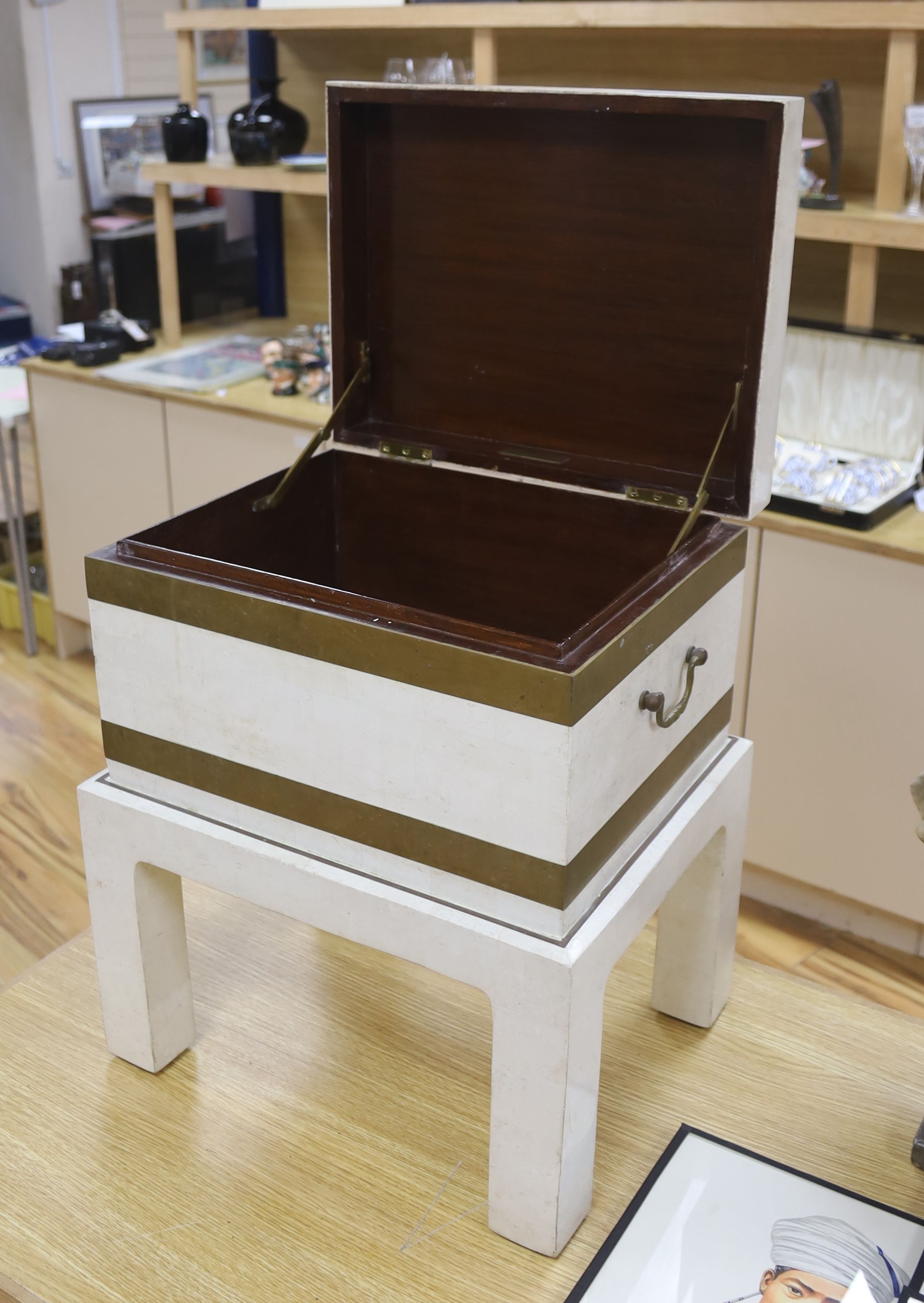 A tessellated limestone box on stand by Maitland Smith, height 49cm